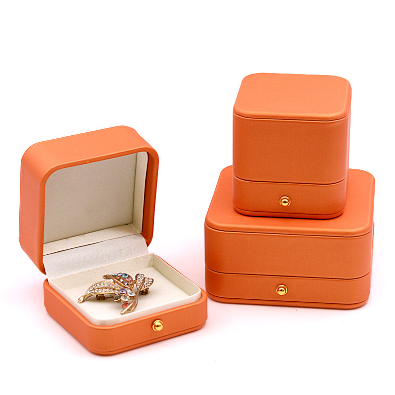 Caja de anillo naranja caballo hebilla de oro caja de anillo caja de pulsera caja de collar caja de oreja caja de broche caja de insignia