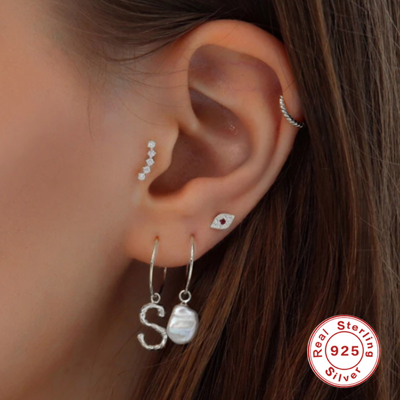 Nueva moda europea y americana ins simple sola fila diamante s925 plata esterlina 16G cabeza plana hilo piercing cartílago