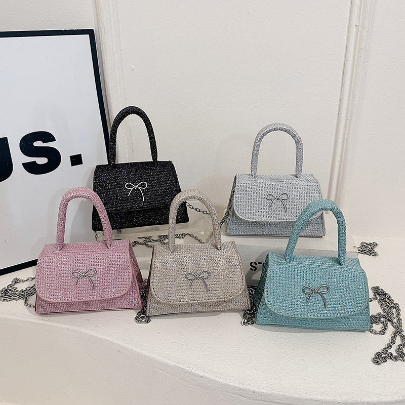 Bolso de mujer con lazo de alta gama 2025 nuevo bolso de mensajero de estilo occidental de moda ins mini bolso cuadrado pequeño portátil de un solo hombro