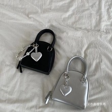 斜挎陈韩国小众设计女包新款可爱手提贝壳包单肩手提包风