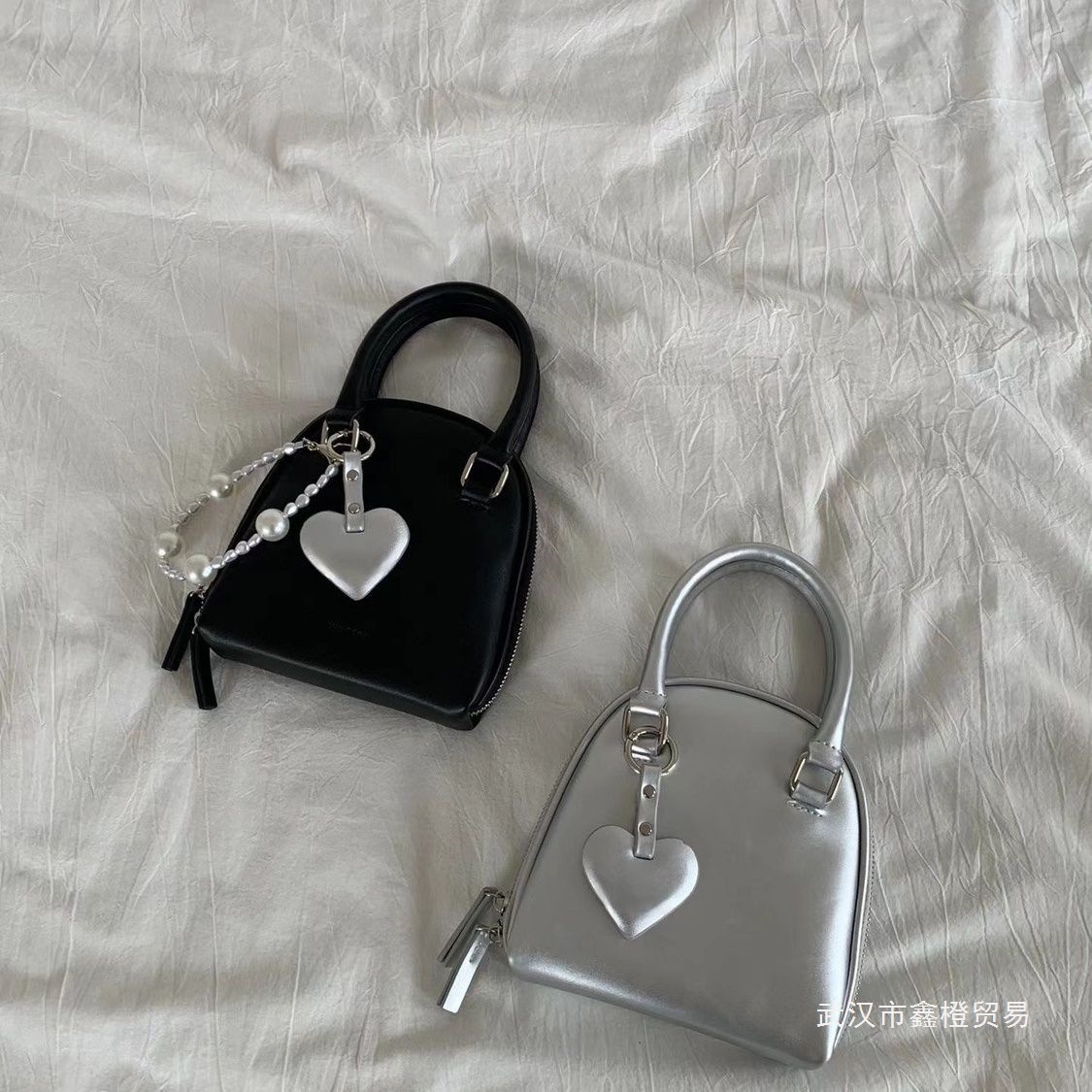 斜挎陈韩国小众设计女包新款可爱手提贝壳包单肩手提包风