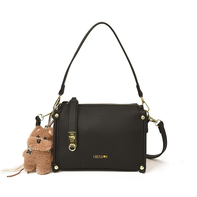Bolsos retro retro de alta calidad para mujeres 2026 nueva textura lichi bolso pequeño estilo coreano simple mochila de hombro