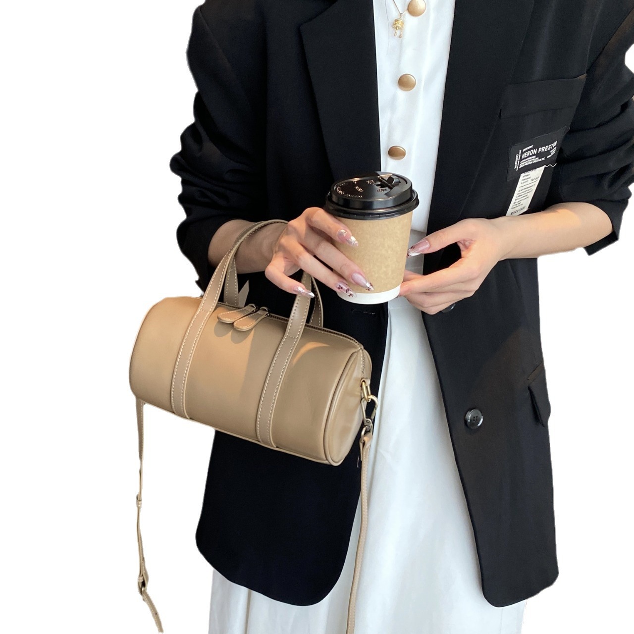 植なめしの上の牛革の枕の包みの女性の高級感の百合の小さい大衆のハンドバッグの女子学生のファッションのボストンバッグの女性