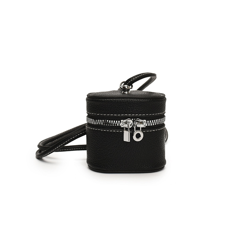 Bolso de hombro para niña coreana simple color sólido mini lindo bolso de cubo para bebé 2025 nuevo bolso de auriculares para niños marea