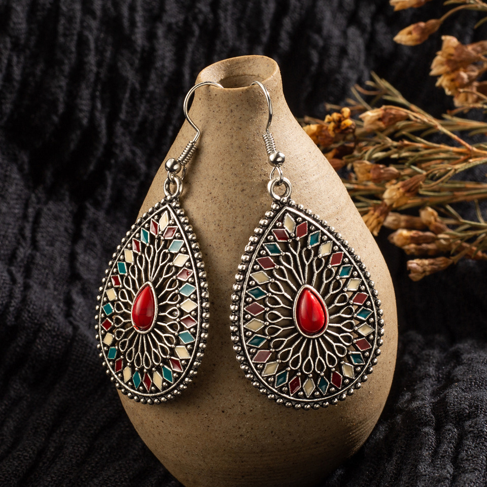 Bohemian Alloy Hollow Drop-shaped Colored Diamond Earrings Wholesale display picture 5