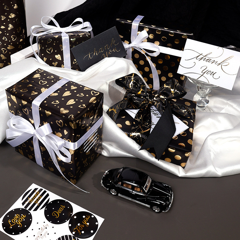 Transfronterizo especial para papel de embalaje de regalo de oro negro, regalo de cumpleaños de San Valentín, papel de regalo de lujo ligero, rollo de gran tamaño