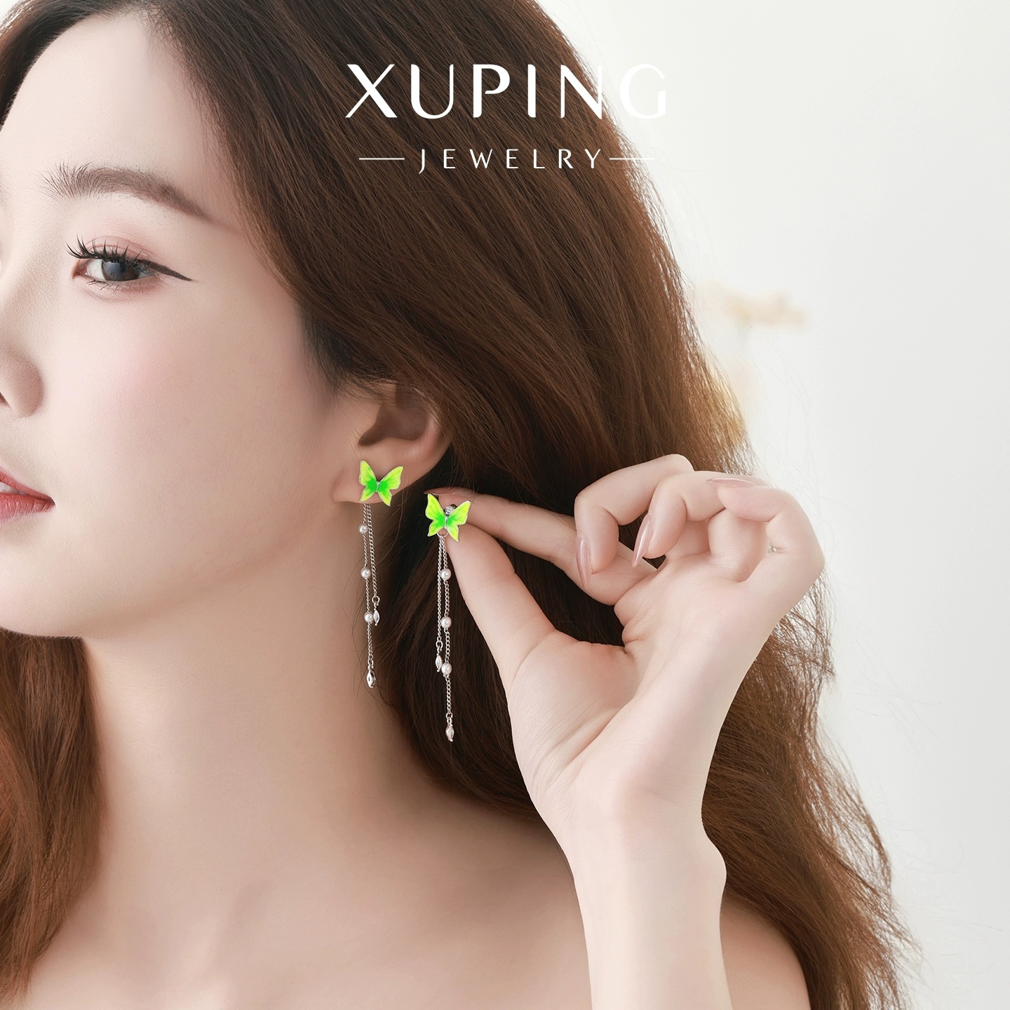 Xuping primavera Fairy Gote series de aceite verde imitación de perlas mariposa pendientes de dos orejetas de temperamento para mujeres