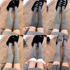 厚い灰色のストッキングの女性秋冬日系jk黒の太ももの靴下を温めます。