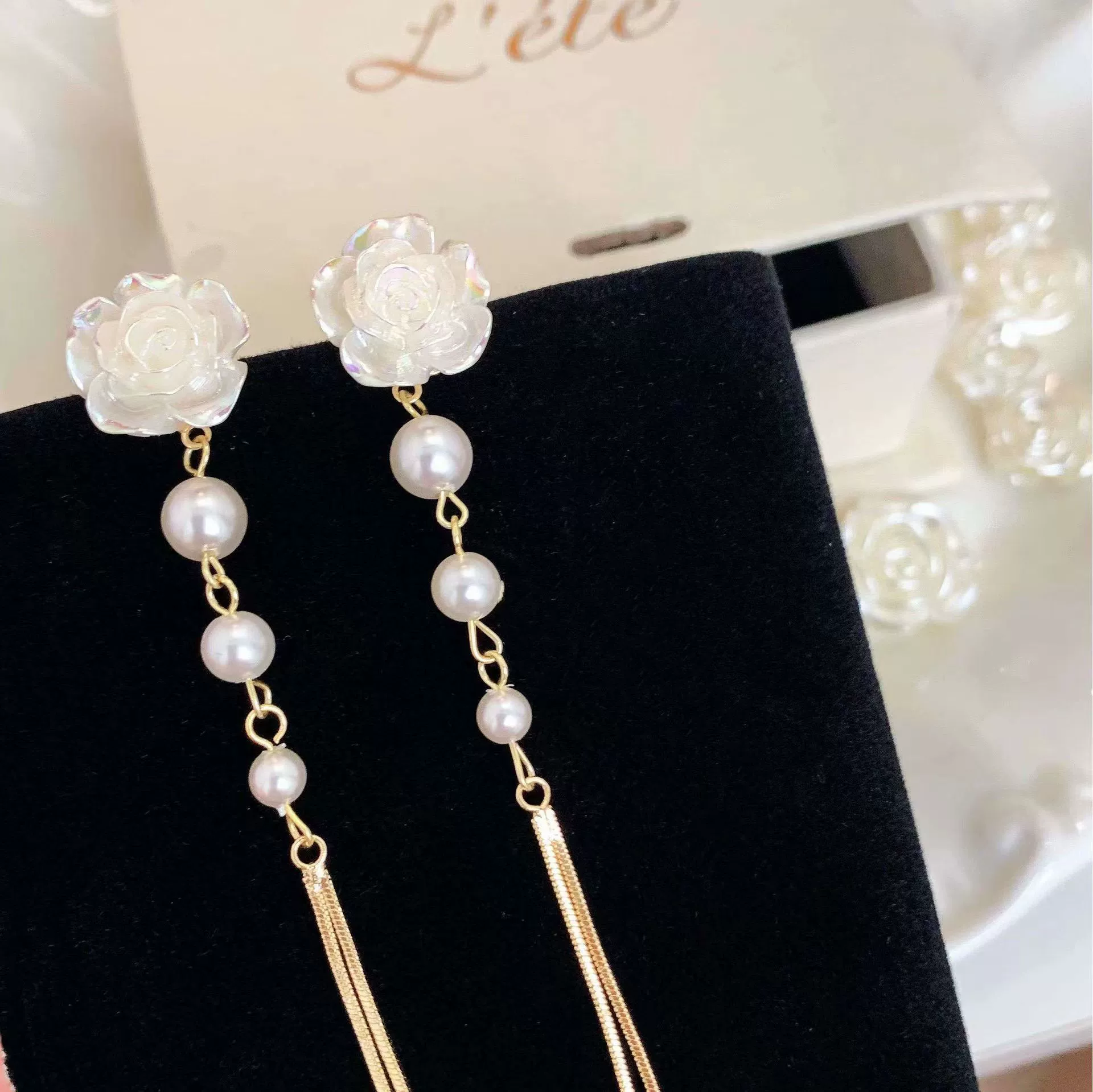 White long mountain tea, small design sophisticated earrings with tassels from pearl, french style, simple and elegant design
