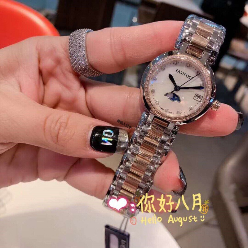 다이아몬드가 세팅된 외부 링, 로즈 쉘, 달의 위상을 나타내는 다이아몬드 스케일