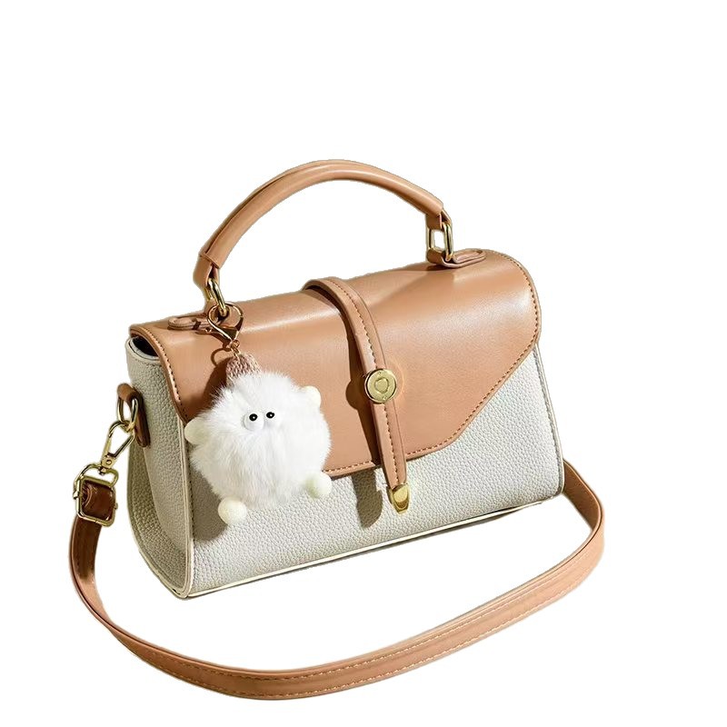 Muñeca colgante bolso mujer mujer 2025 nuevo bolso cuadrado pequeño moda todo-fósforo bolso de mensajero de un solo hombro bolsas transfronterizas
