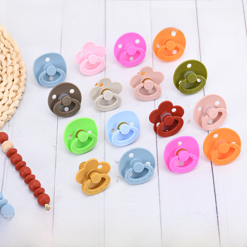 Newborn supplies food grade silicone latex play mouth 0-6 months baby simulation round head pacifier wholesale