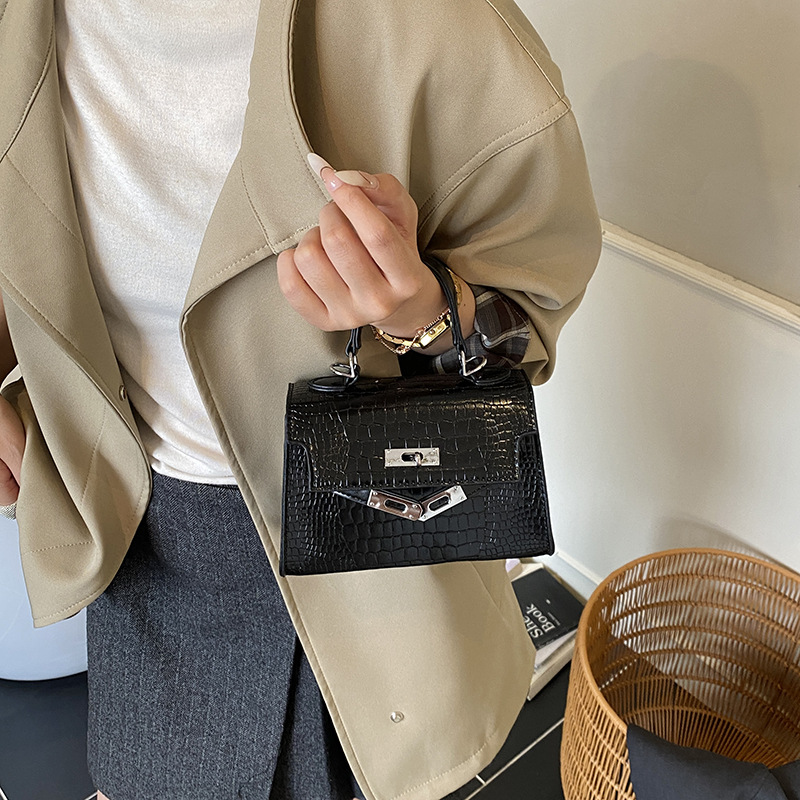 Bolsos de piedra de alta calidad para mujeres 2025, nuevos bolsos de moda portátiles de invierno versátiles mochila de viaje
