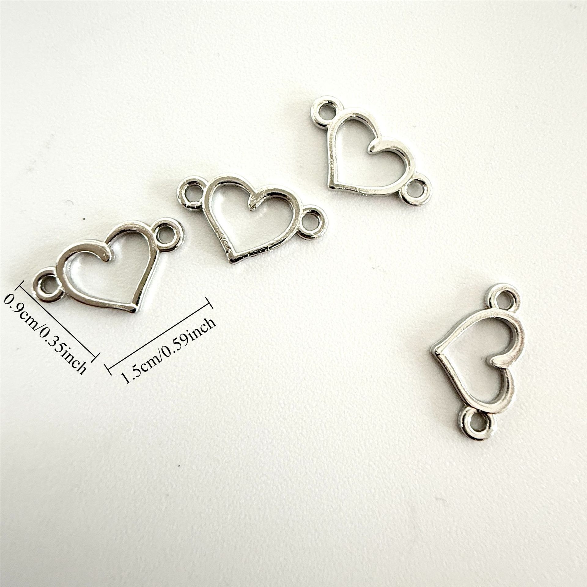 Accesorios de joyería de aleación DIY colgante hueco plata antigua conector de doble agujero accesorios de joyería collar pulsera