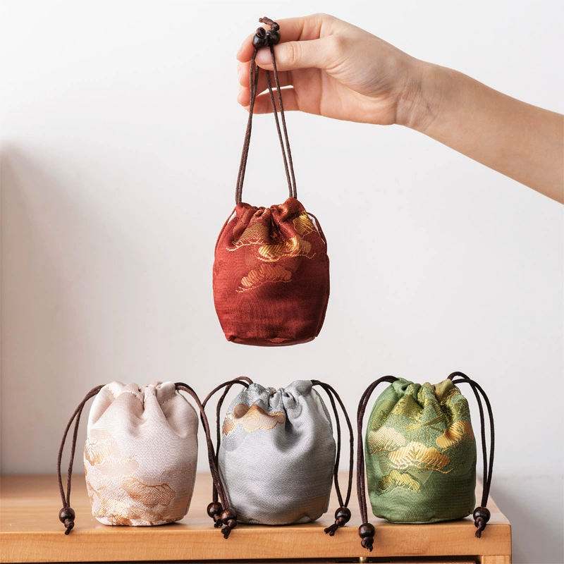 Tea cup, organizer bag for home use, handheld teapot, storage system