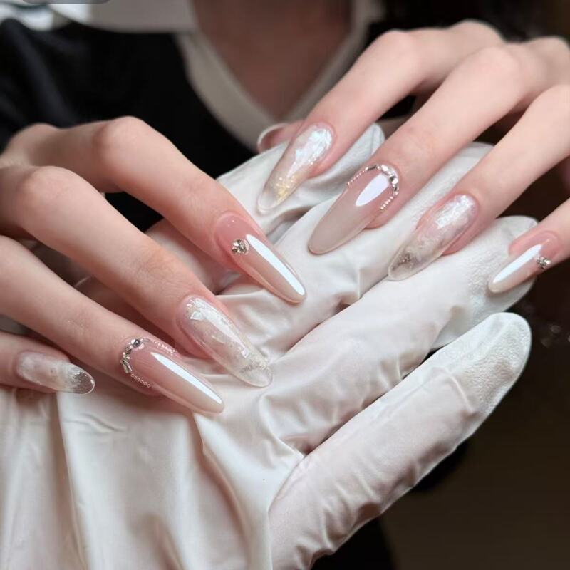 High-end long-length dazzling nail patches with gradient nude color that enhance skin tone, handmade bridal fake nails