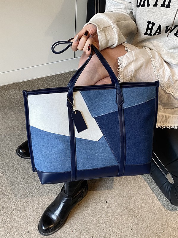 Nicho de diseño de bolso de hombro para mujeres 2026 nueva moda transfronteriza bolso de transporte de moda retro bolso de brazo