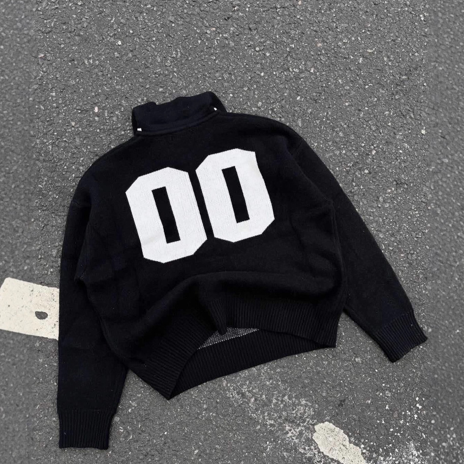 Suéter de punto negro retro americano transfronterizo europeo y americano, suéter suelto de manga larga con cuello de polo para hombre con letras pesadas