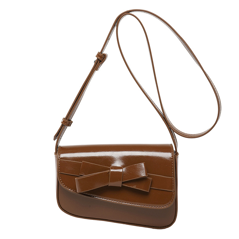 Bolso pequeño de alta calidad 2025 verano nuevo bolso femenino diseño de nicho bolso de hombro lindo lazo bolso de mensajero