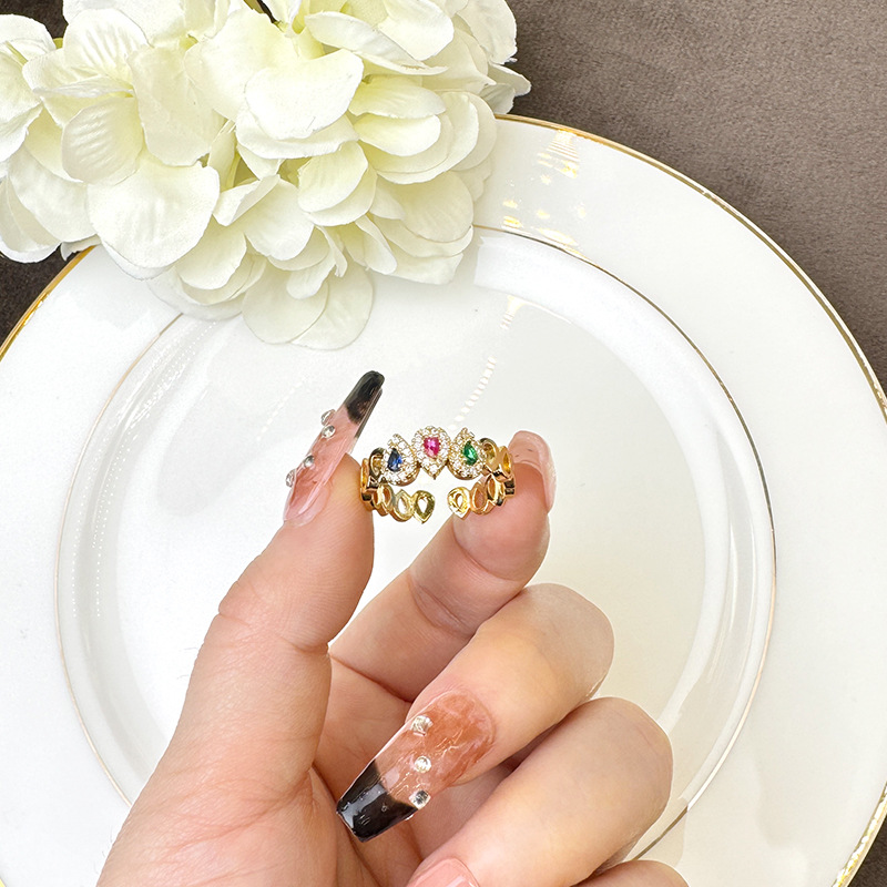 Gufa Sha oro galvanizado 18 quilates oro transfronterizo Europa y los Estados Unidos gota de agua zircon anillo abierto nicho de joyería de alta calidad