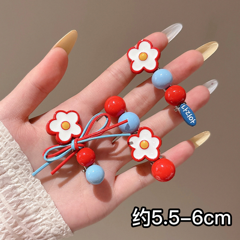 Clip de cabello de flor de leopardo para mujeres clip de cabello de alto nivel frente clip de frangeo 2025 nuevo clip lateral clip de cabello toque