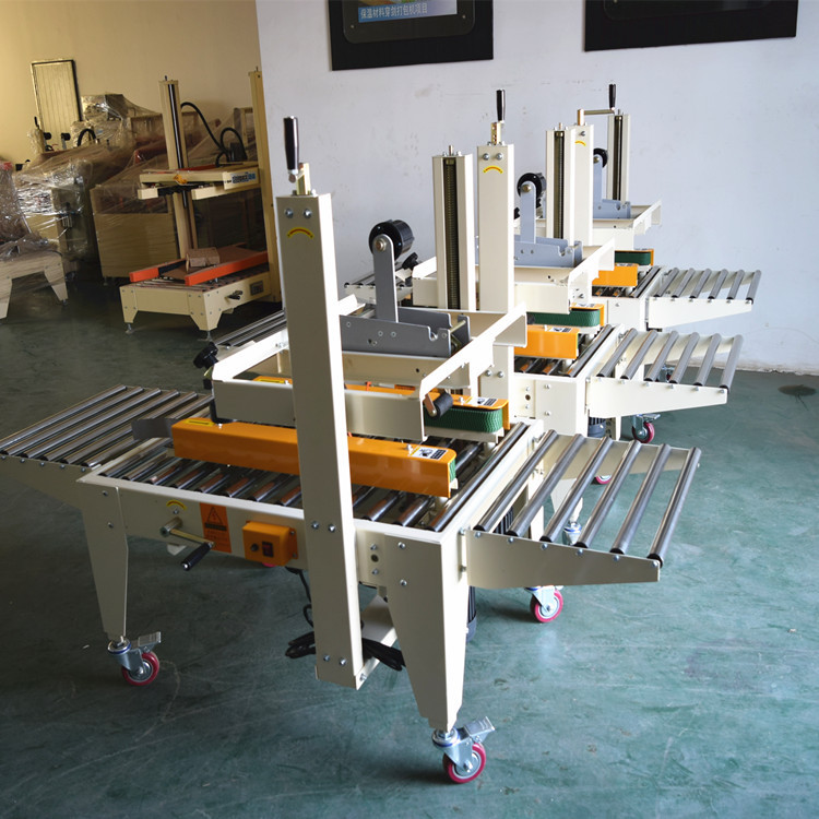 厂家直销青岛自动封箱机 上下一字型封箱机 封箱简单新伟嘉音