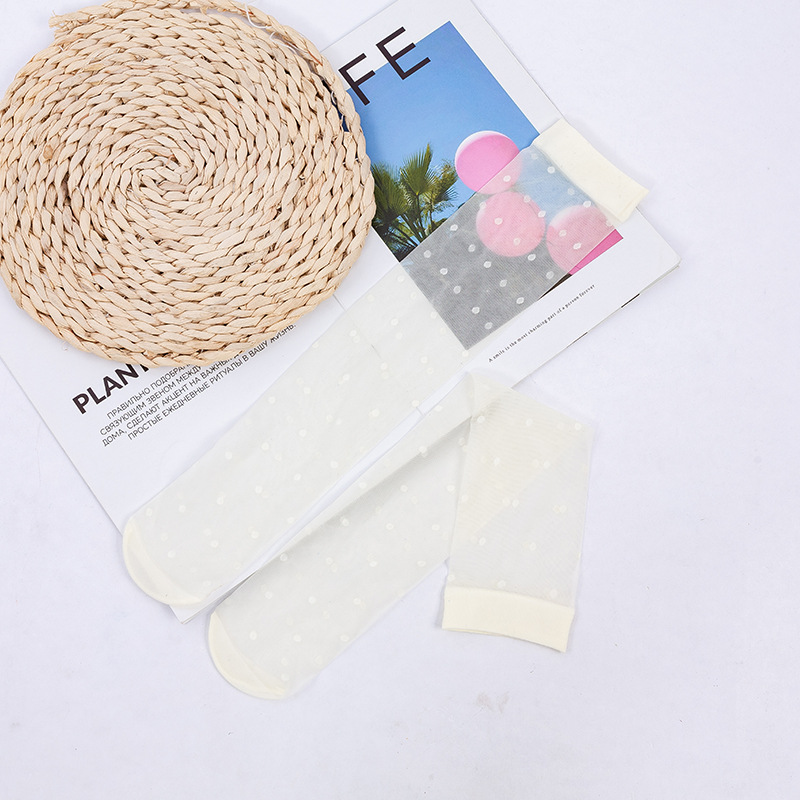 Calcetines de pantorrilla de las mujeres pequeño punto transparente color sólido calcetines blancos y negros estilo JK sexy pierna calcetines altos fábrica al por mayor