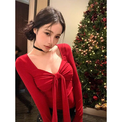 赤い蝶結びの長袖のtシャツの女性の春は純粋に身を引き付けたいです。