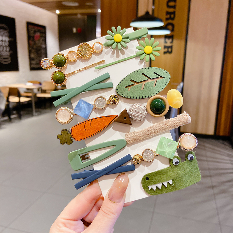 Clip de flequillo lateral rojo de la red femenina 2025 nueva horquilla simple clip de una línea horquilla clip de cabello roto tocado clip de pico de pato