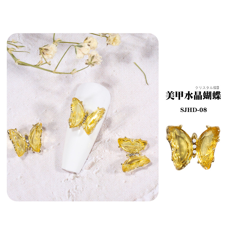 2021 nueva celebridad en línea belleza de uñas mariposa de cristal mágico estilo INS hielo tridimensional transparente Aurora diamante metal decoración de uñas