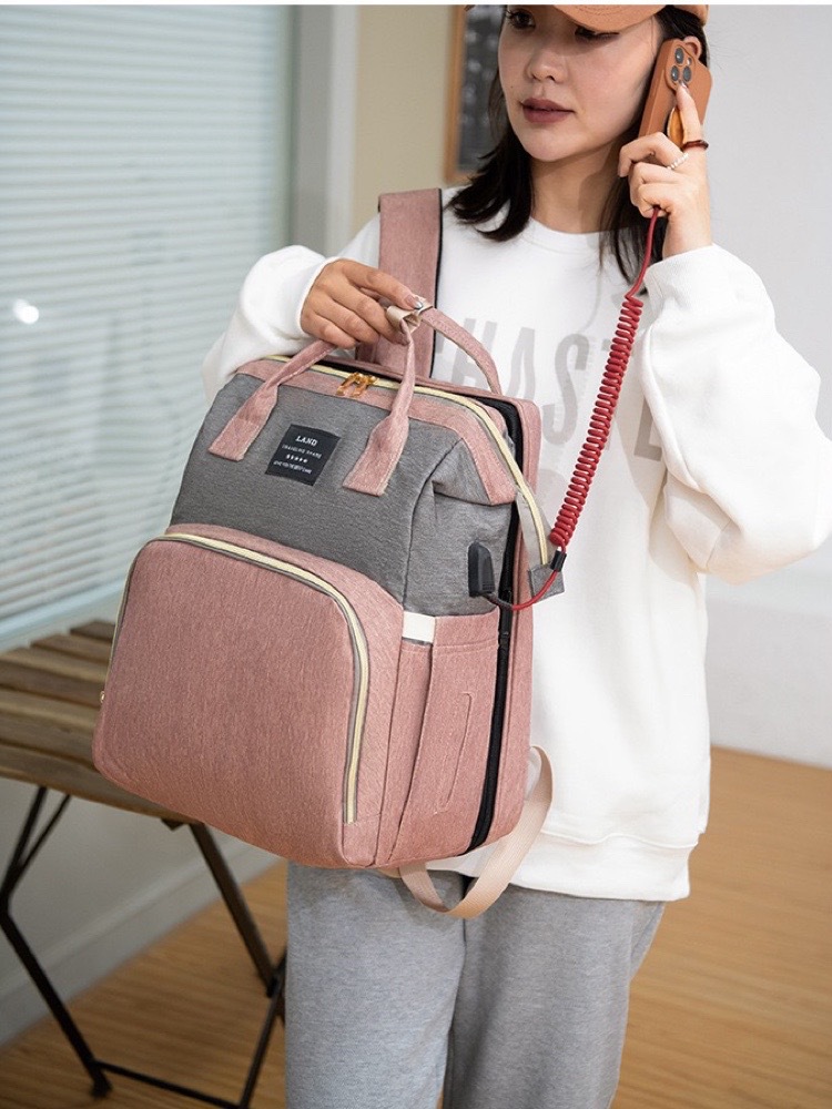 Nuevo japonés y coreano transfronterizo bolso de la momia mochila cuna mochila de gran capacidad hacia fuera bolsa de leche materna y bolsa infantil fábrica
