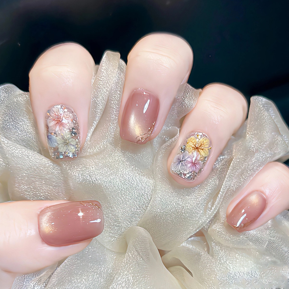 Douyin estilo caliente flor seca ojo de gato uñas parche de uñas sentido avanzado 10 piezas de código dividido armadura portátil hecha a mano corta hecha a mano