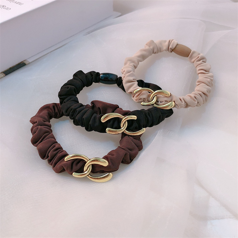 aleación de moda intestino delgado cabello anillo de cabeza cuerda de mujer temperamento simple atar joyas de cabello nuevo estilo de alta sensación simple joyas de cabello cuerda