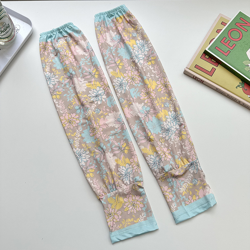 Mangas de protección solar para mujeres de verano nuevo estilo al aire libre anti-UV patrón de montar mangas de brazo de impresión de viento elegante