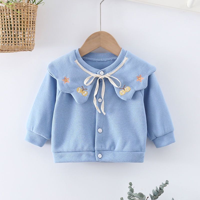 Cárdigan azul con cuello de mariposa