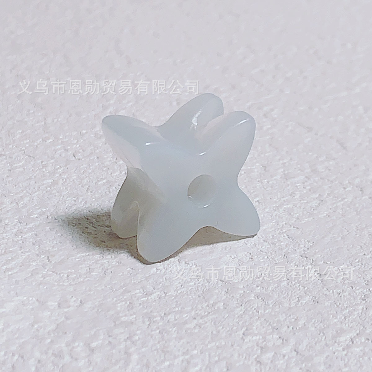 X (translucent gray)