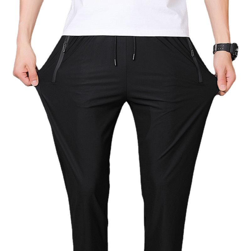 2024 pantalones de seda de hielo pantalones casuales deportivos elásticos finos de verano para hombres pantalones de secado rápido con aire acondicionado de talla grande sueltos y gordos