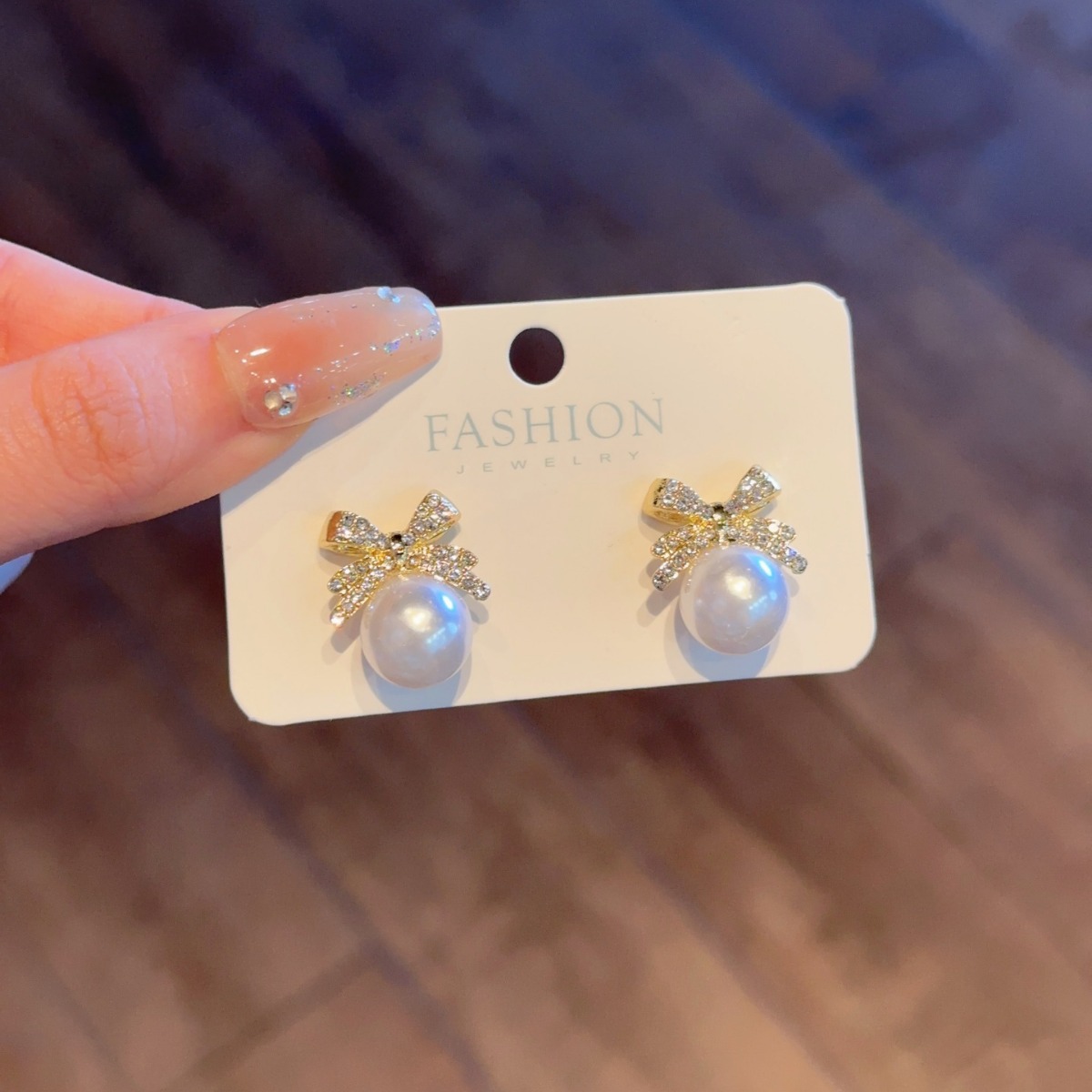 Korean bow pearl studded diamond temperament, niche, light luxury, high-end design, earring earrings_voghion.com