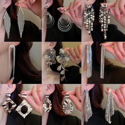 Silver needle flower bow metal tassel earrings European and American exaggerated luxury earrings niche creative new earrings for women