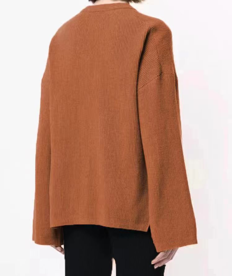 Women's all-in-one solid color three-button long sleeve loose side slit knit sweater_voghion.com