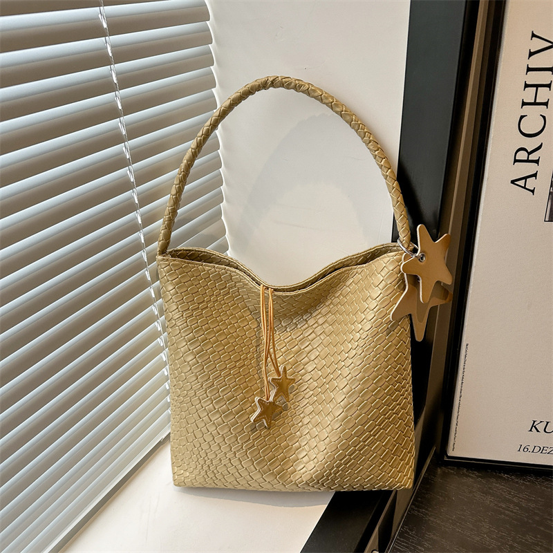 2025 bolso tejido súper caliente para mujer nuevo bolso de axila de un solo hombro de alta gama para mujer bolso de viaje de gran capacidad