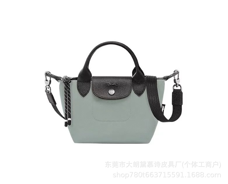 Agencia de distribución transfronteriza, segunda generación de productos de alta calidad, tela reciclada, bolsa de bola de masa, bandolera, bolso de mano