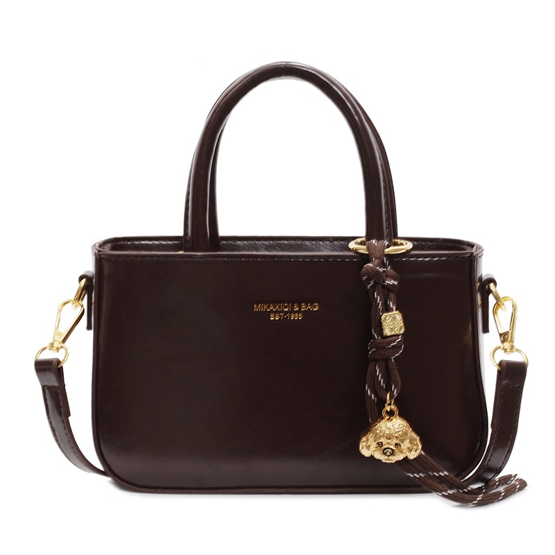 Transfronterizo simple bolso de mano ocio para mujeres 2025 nuevo bolso de hombro de moda retro popular bolso de mochila versátil