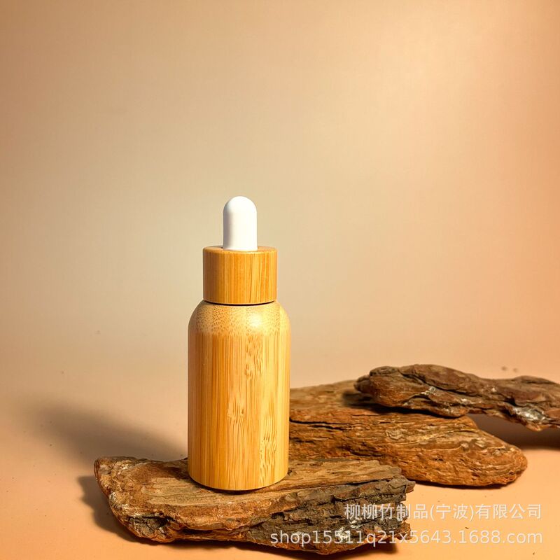 竹のゴムの頭の点滴の瓶の精華の液体の携帯は瓶の竹の製の光を避ける精華を分けて瓶の竹の木を分けて瓶を詰めます|undefined