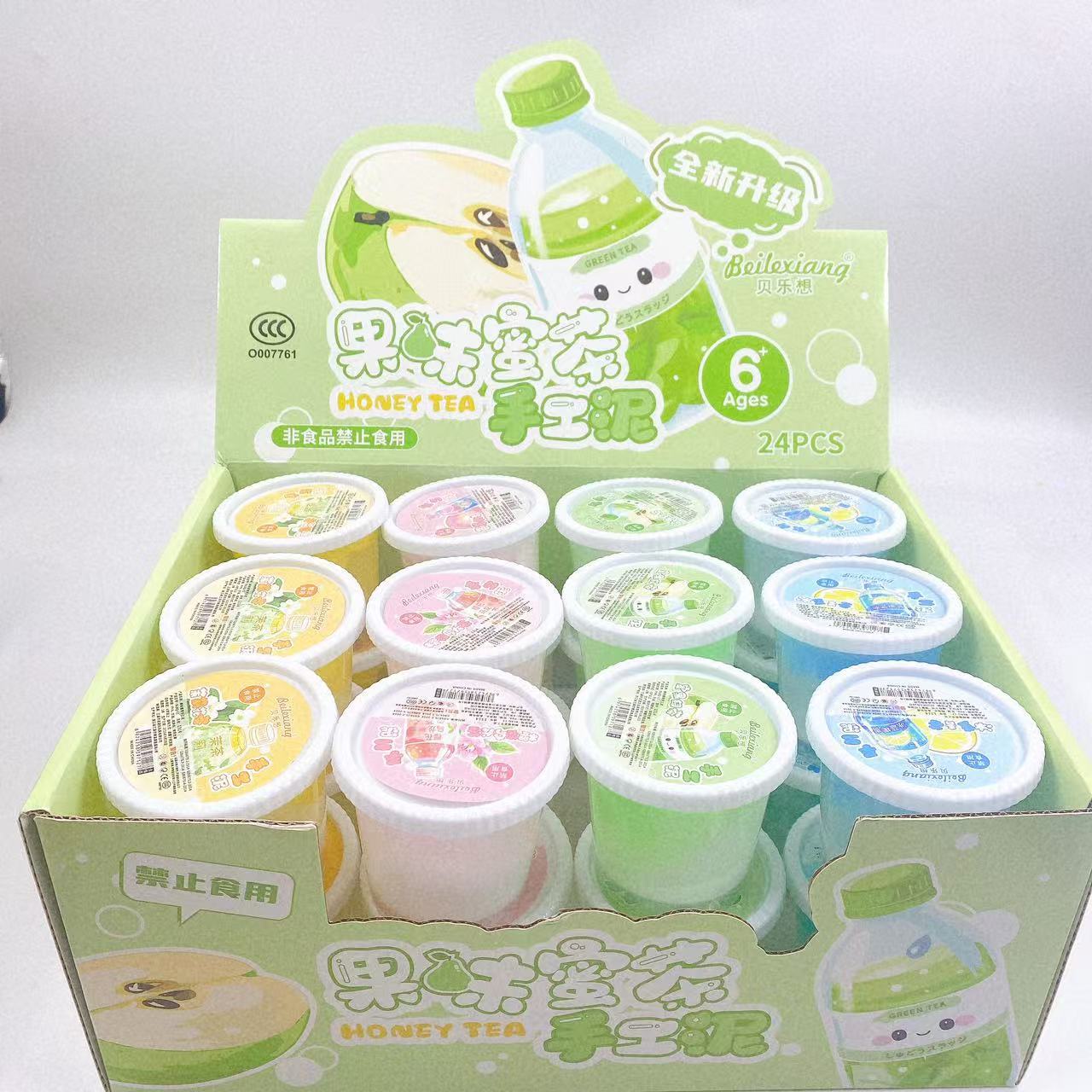 Nuevo plástico espumoso creativo botella redonda de barro de cristal Slime caja de color degradado de dos colores descomprime juguetes al por mayor