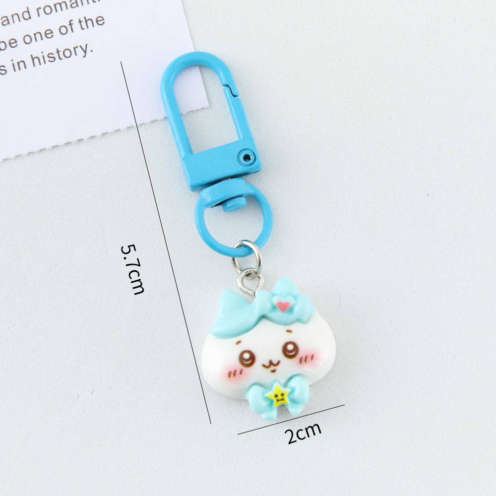 Caricatura linda corbata pequeña ocho llaveros colgantes pareja amigas bolsos colgantes de alto valor de belleza llaveros de corazón de niña