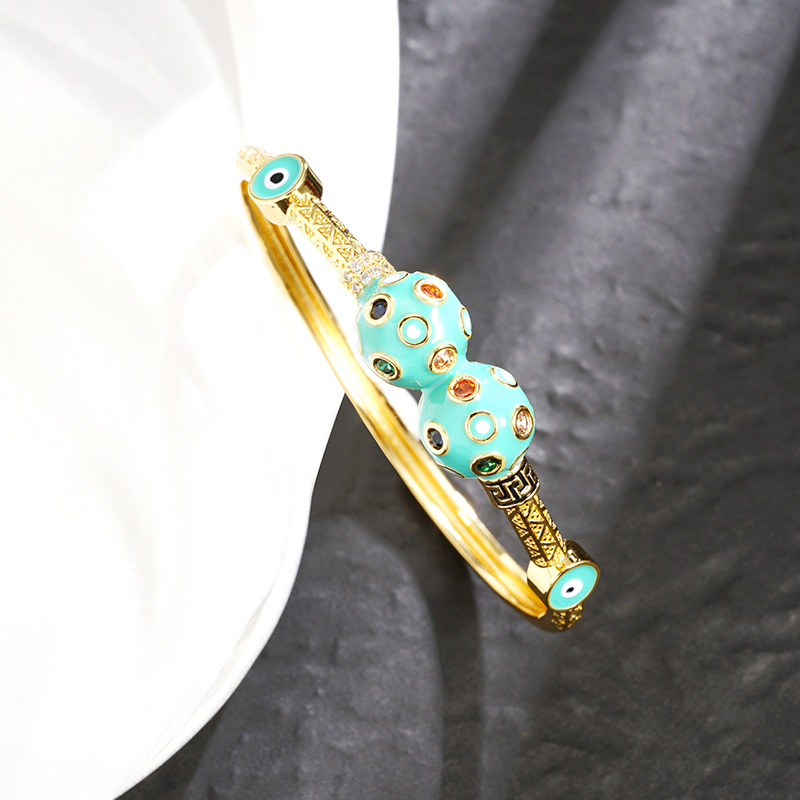 Pulsera de aceite de goteo de ojo de diablo S3229