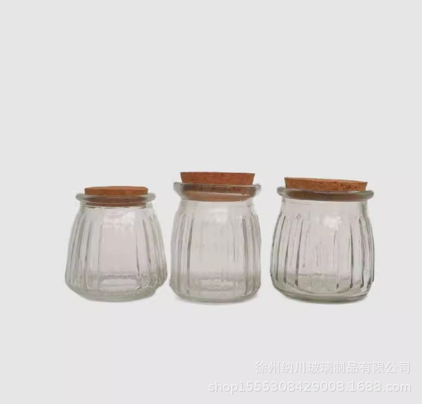 Botella de pudín de vidrio al por mayor de 100ml botella de leche gruesa botella de yogur resistente a altas temperaturas botella de vidrio tapón de madera botella de deseo botella