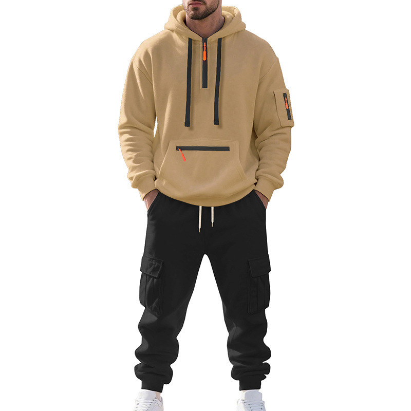 카멜색 상의에 검정색 바지