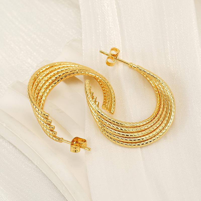 Pendientes de acero inoxidable dorado de 18k de moda transfronteriza para mujer, lujo ligero, pendientes de acero de titanio que no se desvanece